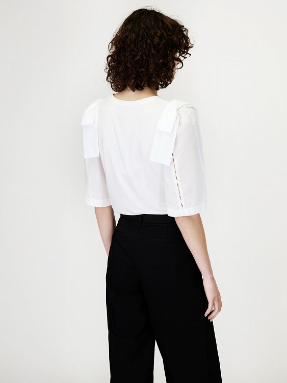 Jersey Blous V-neck with bow in shoulders