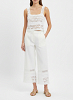 Emi crochet-detailed pants