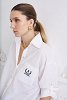 Shirt with pocket embroidery
